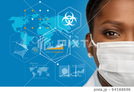 doctor in medical mask over world pandemia map doctor in medical mask over world pandemia map 64588696