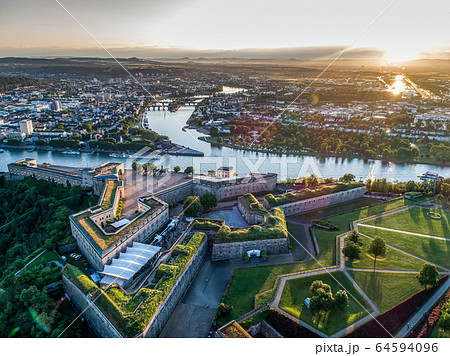 Aerial View of Ehrenbreitstein fortress and Koblenz City in Germany during sunset Aerial View of Ehrenbreitstein fortress and Koblenz City in Germany during sunset 64594096