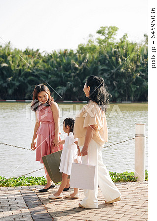 Walking three generations of women Walking three generations of women 64595036