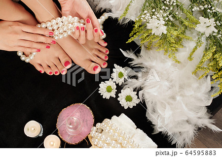 Manicured hands and pedicured feet Manicured hands and pedicured feet 64595883