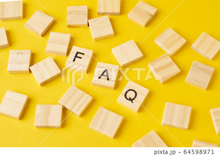 Wooden blocks with abbreviation FAQ on the yellow Wooden blocks with abbreviation FAQ on the yellow 64598971