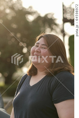 Chubby woman That is confident in yourself and happy Chubby woman That is confident in yourself and happy 64598972