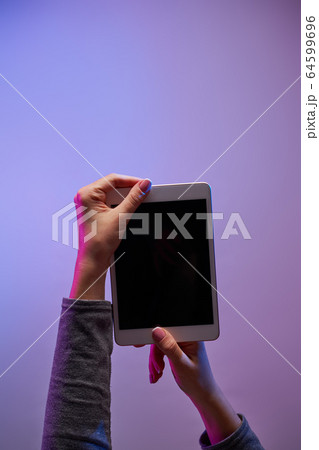 Human's hands with smartphone and blank black screen 64599696