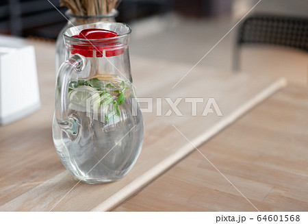 Healthy food and drinks. Water in glass mug with Healthy food and drinks. Water in glass mug with 64601568