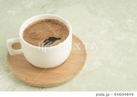 cup of Turkish coffee on a green with copy space cup of Turkish coffee on a green with copy space 64604849