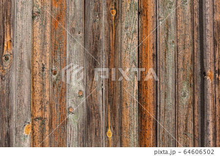 Vertical closeup of old wooden plank wall, brown 64606502