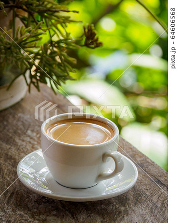 Hot coffee americano on the old wooden table 64606568