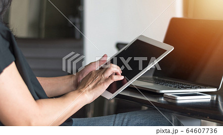 Blog writer at home or business person digital lifestyle busing smart device working on internet communication technology, reading e-book, paying online banking e-commerce payment Blog writer at home or business person digital lifestyle busing smart device working on internet communication technology, reading e-book, paying online banking e-commerce payment 64607736