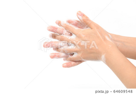 Woman use soap and washing hands isolated on white Woman use soap and washing hands isolated on white 64609548