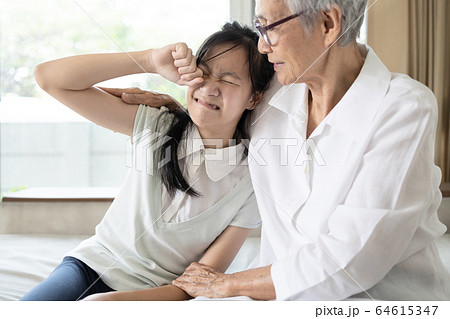 Asian senior woman give advice,talk sharing thoughts care,support to child girl,loving grandmother speak have comforting,consoling her granddaughter,sad,crying,problems,consultation,need encouragement Asian senior woman give advice,talk sharing thoughts care,support to child girl,loving grandmother speak have comforting,consoling her granddaughter,sad,crying,problems,consultation,need encouragement 64615347