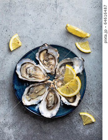 Fresh opened oysters Fresh opened oysters 64616487