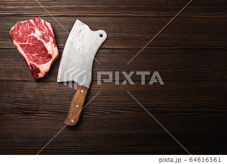 Ribeye steak and meat cleaver 64616561