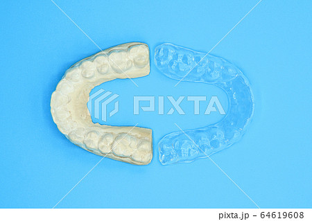 Dental plaster mold and orthodontic silicone trainer. Mobile orthodontic appliance for dental 64619608