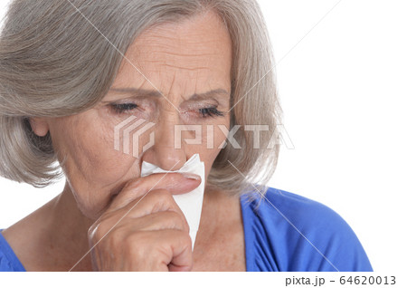 Close up portrait of crying senior woman isolated Close up portrait of crying senior woman isolated 64620013