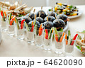 Catering, buffet at the event with various snacks. 64620090