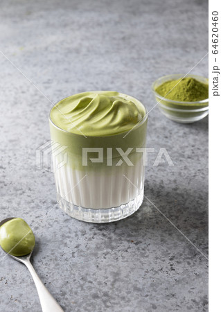 Dalgona iced Matcha latte with whipped matcha Dalgona iced Matcha latte with whipped matcha 64620460