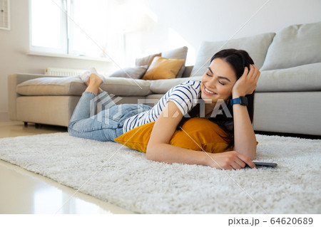 Beautiful gorgeous lady feeling happiness and calmness 64620689