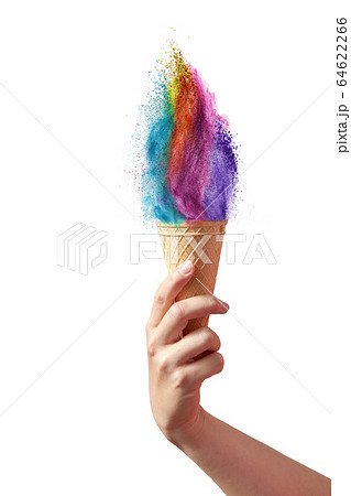 Ice cream from rainbow dust splash in a waffle cone in a hand. Ice cream from rainbow dust splash in a waffle cone in a hand. 64622266
