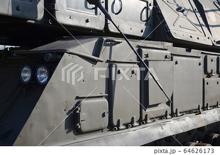 Close up of green armoured caterpillar transport. 64626173