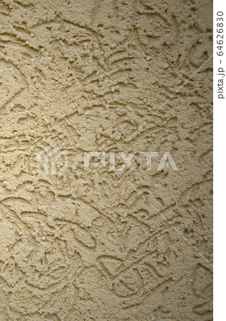 The texture of the beige decorative plaster in The texture of the beige decorative plaster in 64626830