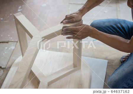 Using sandpaper scrub plank wood for making table, Using sandpaper scrub plank wood for making table, 64637162