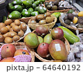 Avocados, coconuts, limes, kiwi and mangoes, fruit is beautiful in wooden plates 64640192