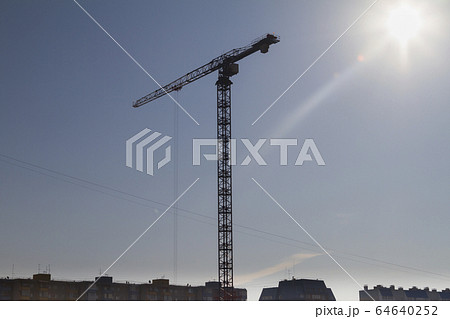 High construction crane against the background of 64640252