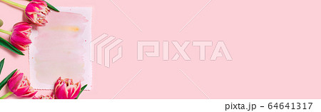 A greeting card on a pink background. 64641317