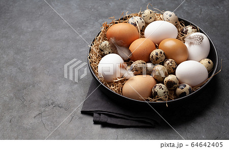 White, brown and quail eggs 64642405