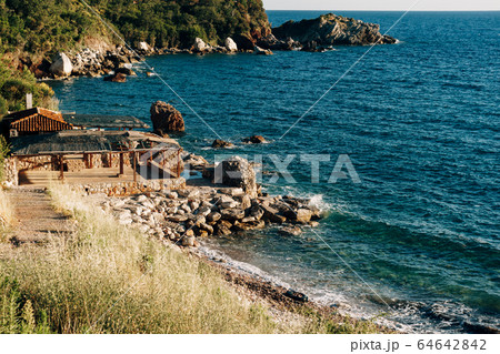 Cafe on a rocky sea shore in Montenegro Cafe on a rocky sea shore in Montenegro 64642842