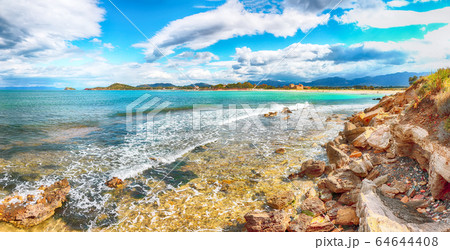 The Nora bay and beach, the medieval Sant'Efisio The Nora bay and beach, the medieval Sant'Efisio 64644408