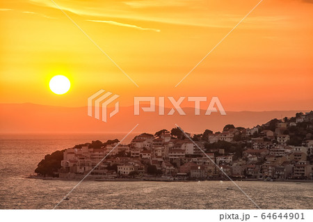 Sunset overview across the beautiful bay of Igrane 64644901