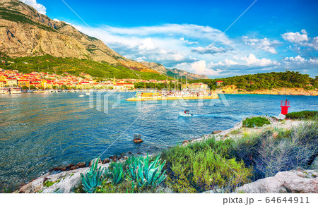 Splendid View of the resort town of Makarska on a Splendid View of the resort town of Makarska on a 64644911