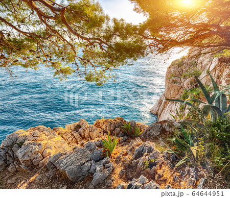Beautiful sunset above Adriatic sea and coastline Beautiful sunset above Adriatic sea and coastline 64644951