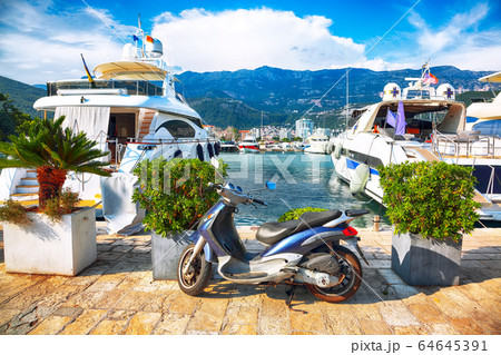 View of waterfront with boats and yachts moored up 64645391