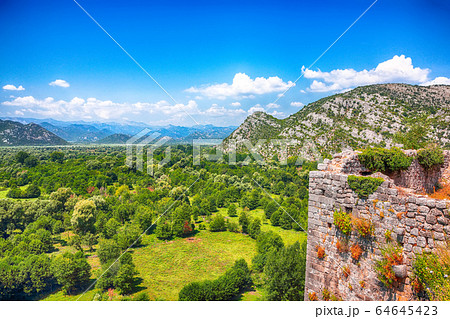 Aerial sunny morning view of valley of Moraca 64645423