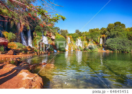 Picturesque Kravice waterfalls in the National Picturesque Kravice waterfalls in the National 64645451