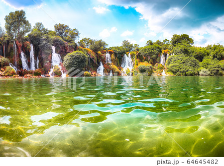 Picturesque Kravice waterfalls in the National 64645482