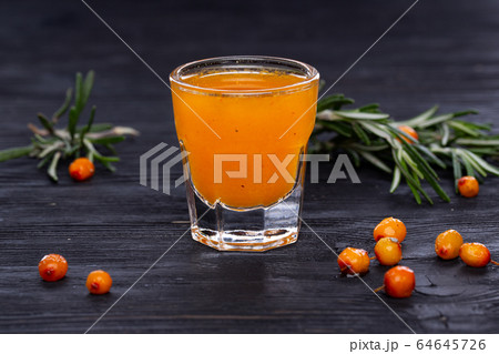 Gorilka with a sea-buckthorn, alcohol, alcoholic drink with a sea-buckthorn Gorilka with a sea-buckthorn, alcohol, alcoholic drink with a sea-buckthorn 64645726