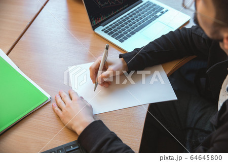 Caucasian entrepreneur, businessman, manager working concentrated in office 64645800