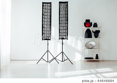 Photo studio flash equipment and accessories of a professional photographer Photo studio flash equipment and accessories of a professional photographer 64648884