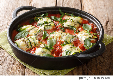 Zucchini rolls baked recipe with ricotta cheese Zucchini rolls baked recipe with ricotta cheese 64649486