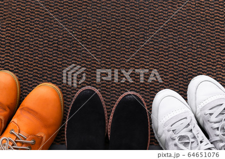 Different men's and women's shoes, pair of Different men's and women's shoes, pair of 64651076
