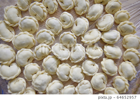 dumplings on the wooden background 64652957