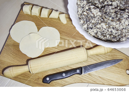 the process of making dumplings at home, view from 64653008
