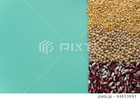 Different legumes - beans, chickpeas and peas. nutritional concept Different legumes - beans, chickpeas and peas. nutritional concept 64653693
