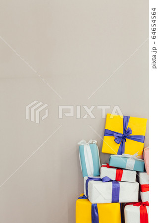 Christmas birthday presents on a gray background 64654564