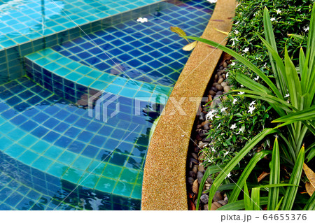 Hotel resort swimming pool 64655376