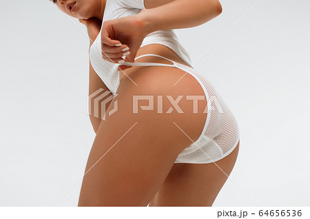 Faceless seductive lady touching lingerie in 64656536