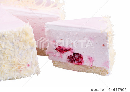 Piece of air cream cake with white chocolate chips Piece of air cream cake with white chocolate chips 64657902